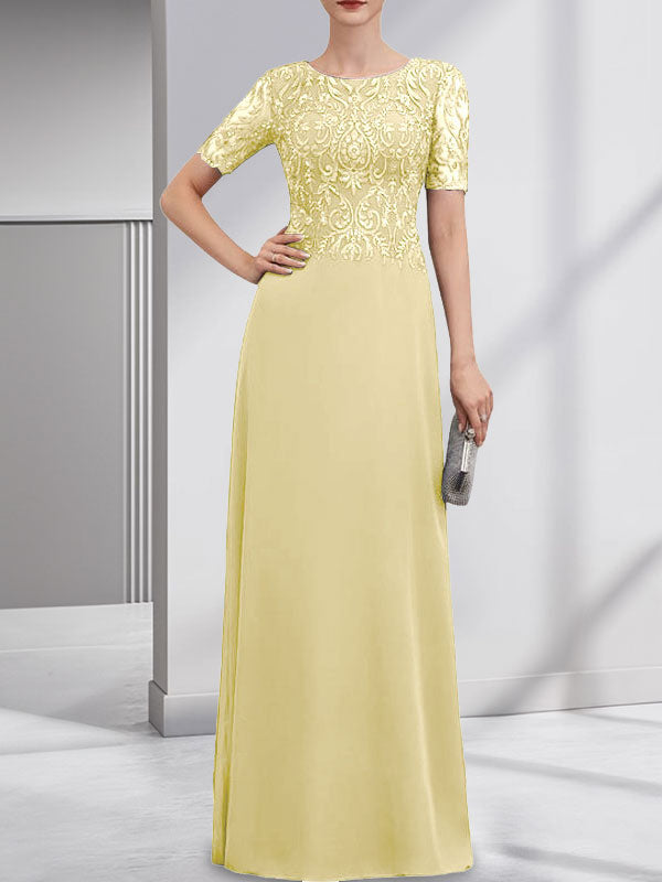 Vestido de novia de corte línea A, escote redondo, largo hasta el suelo, de encaje y gasa con lentejuelas.