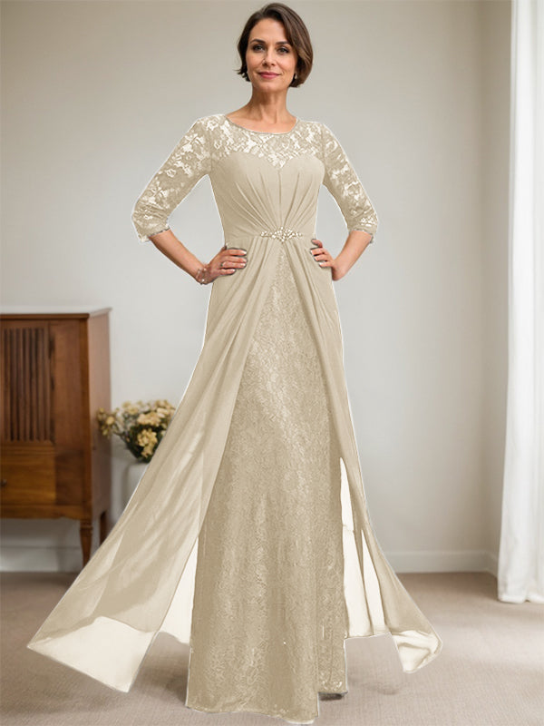 Vestido de novia de corte línea A, escote redondo ilusión, largo hasta el suelo, de gasa de encaje con volantes y pedrería. 