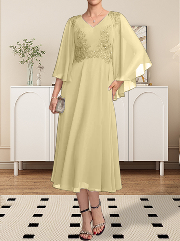 Vestido de corte A, escote en V, largo hasta la rodilla, de gasa, encaje, con lentejuelas y pedrería para la madre de la novia.