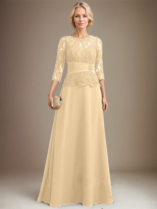 Vestido de corte A, escote ilusión, largo hasta el suelo, de gasa y encaje, para la madre de la novia, con lentejuelas plisadas y pedrería. 