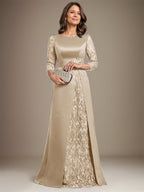 Robe de mère de la mariée en satin de dentelle, coupe trapèze, longue jusqu'au sol, ornée d'appliqués, avec décolleté plongeant et bretelles.
