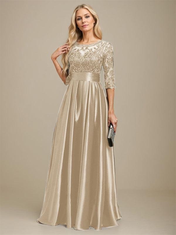 Vestido de madrina de la novia, corte en A, escote ilusión, largo hasta el suelo, satén elástico con encaje y lazo de lentejuelas. 