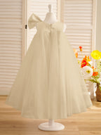 Vestido de niña pequeña de las flores, corte en A, con gran lazo y tul, hasta la rodilla. 