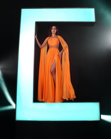 Charmante robe de bal trapèze sans manches à volants en mousseline de soie fendue sur le devant