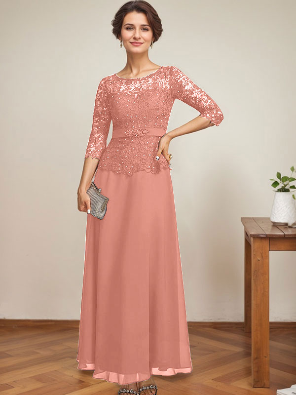 Vestido de novia corte A, escote redondo ilusión, largo hasta el tobillo, de gasa y encaje, con pedrería y detalles de diamantes de imitación. 