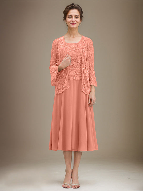 Vestido de novia de corte línea A, escote redondo, largo hasta la rodilla, de encaje y gasa con lentejuelas. 