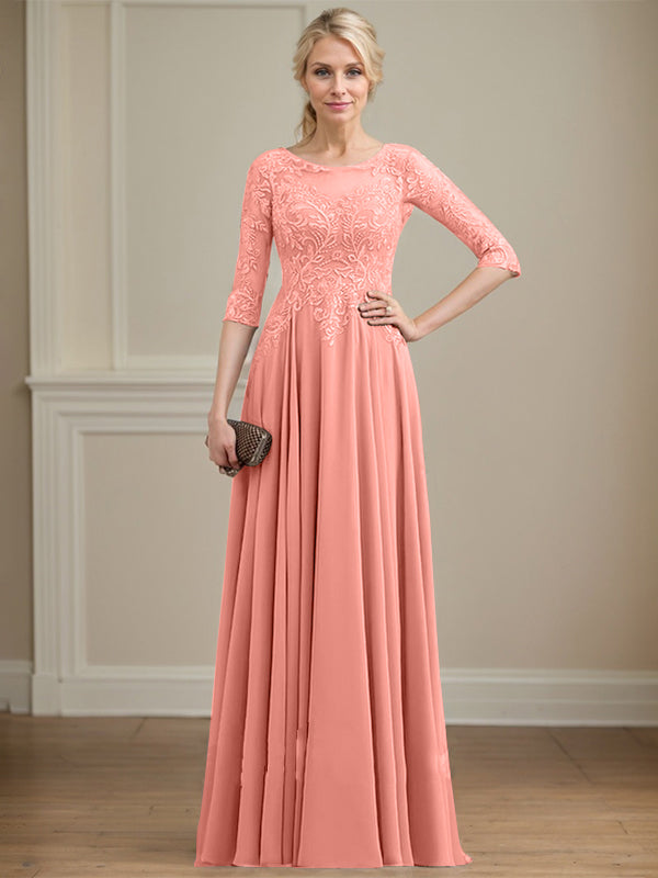 Vestido de novia de corte A, escote redondo, ilusión, largo hasta el suelo, de encaje y gasa con lentejuelas. 