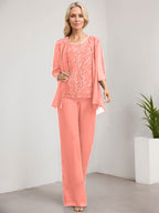 Vestido de novia de gasa con encaje y lentejuelas, estilo mono/pantalón, largo hasta el suelo, con escote redondo.