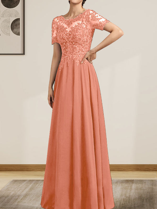 Vestido de corte A, escote ilusión, largo hasta el suelo, de gasa y encaje, con lentejuelas y pedrería, para la madre de la novia.
