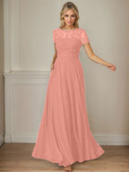 Robe en mousseline de soie bleu marine foncé, coupe trapèze, col bateau et sequins 