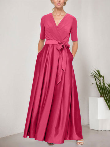 Robe de bal à encolure cache-cœur avec jupe ample en satin et corsage en jersey 