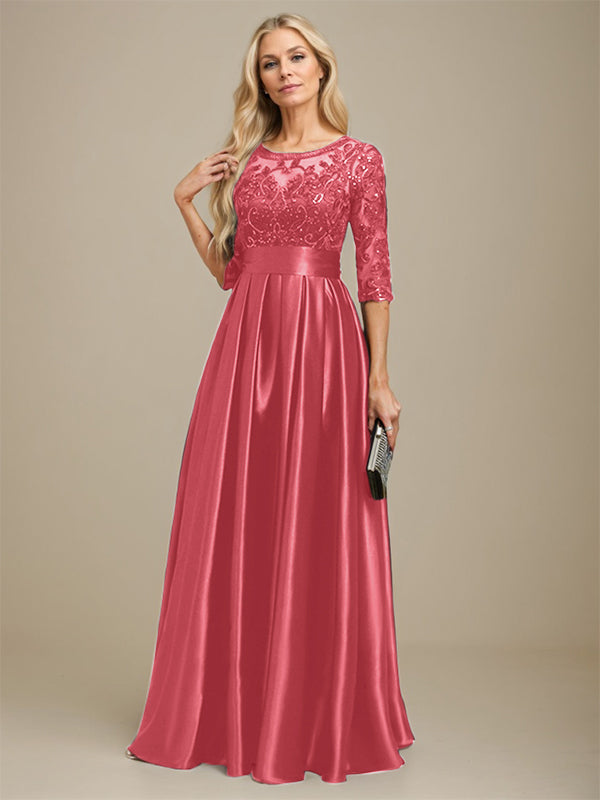 Robe de mariée longue en satin stretch dentelle et dentelle, coupe trapèze, décolleté illusion, ornée d'un nœud à sequins 