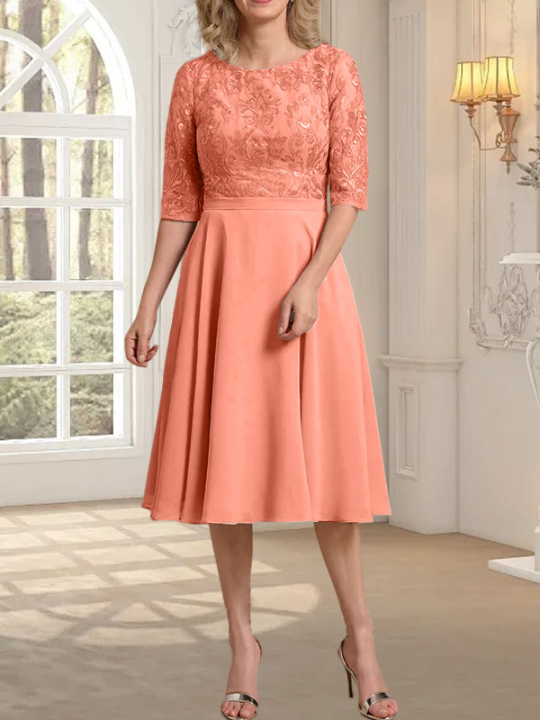 Vestido de novia de gasa de encaje, corte en A, escote redondo y largo hasta la rodilla.