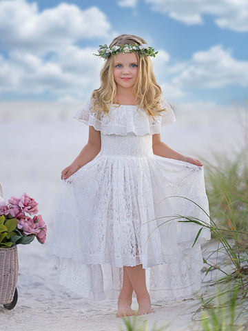 Robe de vacances à jupe asymétrique en dentelle blanche 