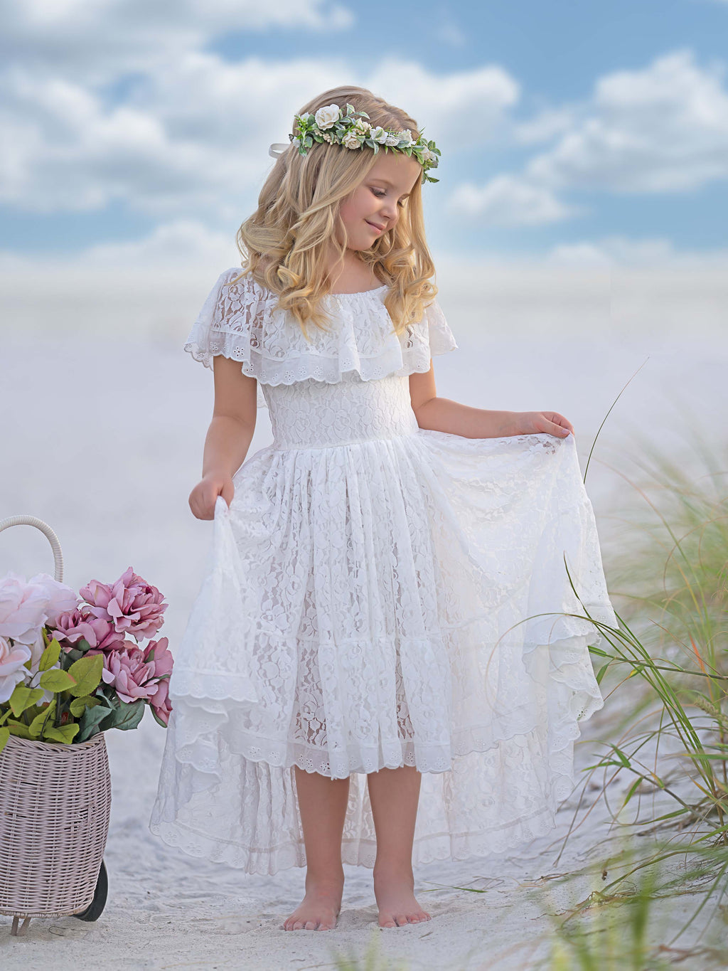 Robe de vacances à jupe asymétrique en dentelle blanche 