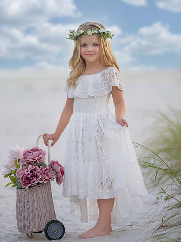 Robe de vacances à jupe asymétrique en dentelle blanche 