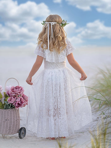 Robe de vacances à jupe asymétrique en dentelle blanche 