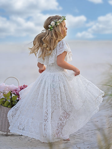 Robe de vacances à jupe asymétrique en dentelle blanche 