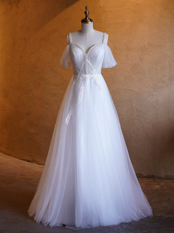 Vestidos de fiesta largos hasta el suelo con escote en V y adornos de perlas