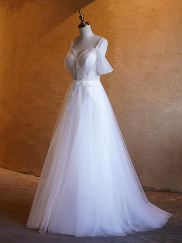 Vestidos de fiesta largos hasta el suelo con escote en V y adornos de perlas