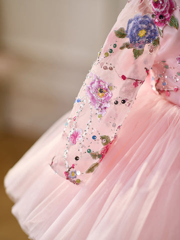 Vestido de bebé niña color lila con lentejuelas, mangas largas con volantes y largo hasta la rodilla 