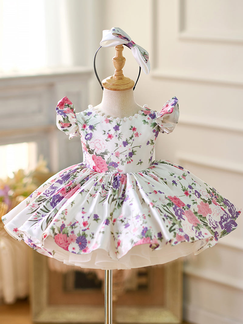 Vestido de bebé niña con mangas abullonadas y estampado floral hasta la rodilla 