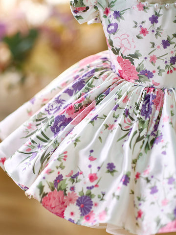 Vestido de bebé niña con mangas abullonadas y estampado floral hasta la rodilla 