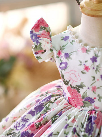 Vestido de bebé niña con mangas abullonadas y estampado floral hasta la rodilla 