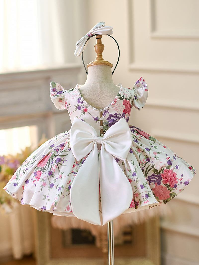 Vestido de bebé niña con mangas abullonadas y estampado floral hasta la rodilla 