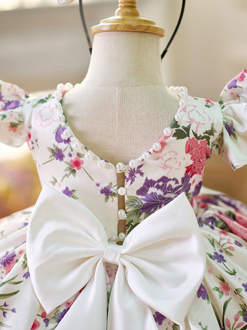 Vestido de bebé niña con mangas abullonadas y estampado floral hasta la rodilla 