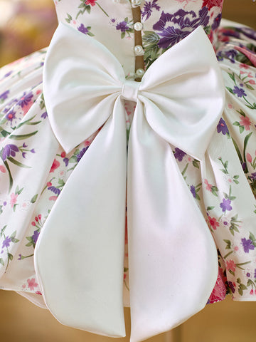 Vestido de bebé niña con mangas abullonadas y estampado floral hasta la rodilla 