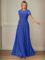 Robe en mousseline de soie bleu marine foncé, coupe trapèze, col bateau et sequins 