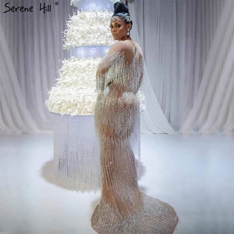 En oferta sin devolución sin reembolsoVenta Dubai Champagne Langarm Sexy Abendkleider 2025 Perlen Quaste Elegante Meerjungfrau Formale Kleid LA6559