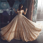 Dubai Gold Backless Glitter Sexy Evening Dresses 2025 Luxury Sleeveless Beach Evening Gowns LA60854