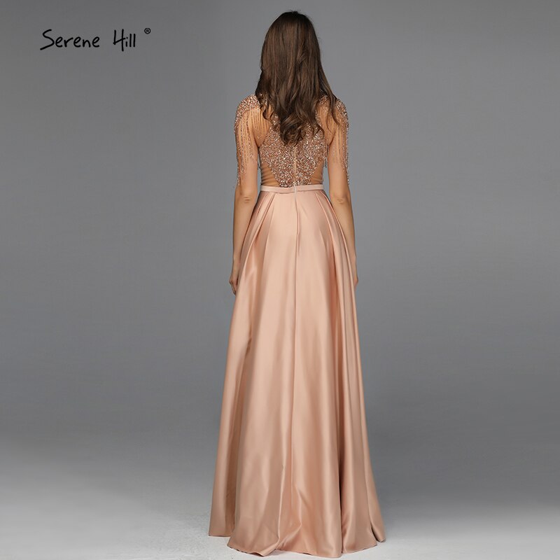 Dubai Gold High Neck Sparkle Prom Dresses 2025 Sleeveless Tassel Beading A-Line Prom Gowns Design LA60998