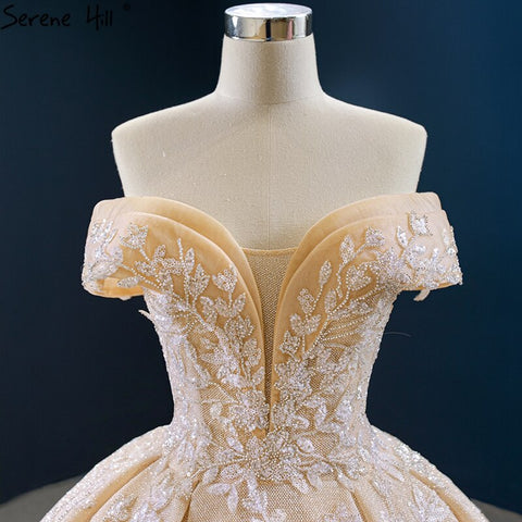 Vestidos de novia Dubai Gold con diseño de hombros descubiertos, colección 2025, flores hechas a mano con pedrería, vestidos de novia sexys HM67135, hechos a medida. 