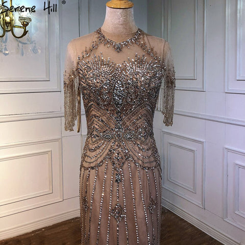Vestido de noche de lujo estilo sirena color nude, cuello redondo, manga corta, con cuentas y borlas, modelo LA70646 