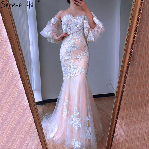 Vestidos de novia estilo sirena, color blanco nude, sexys, estilo Dubai, colección 2025, con mangas abullonadas, flores y pedrería. Modelo LA70417. Hechos a medida. 