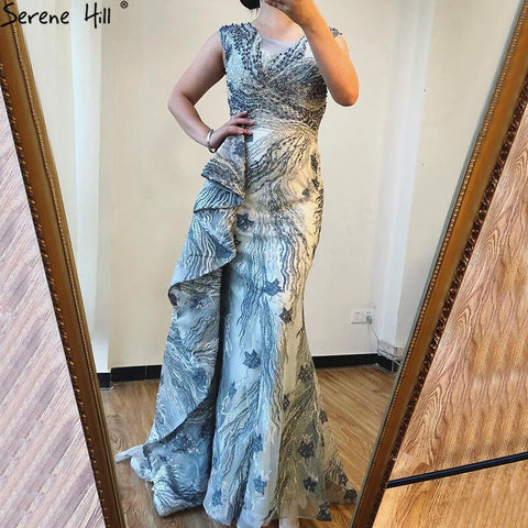 Vestidos de noche de sirena rosa de Dubai sin mangas, vestidos de fiesta de encaje con cuentas y cuello redondo de alta gama 2025 LA70669 