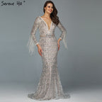 On Sale no return no refundSale Dubai Silver V-Neck Tassel Beading Mermaid Evening Dresses 2025 Long Sleeve  Luxury Sexy Evening Gowns LA60770