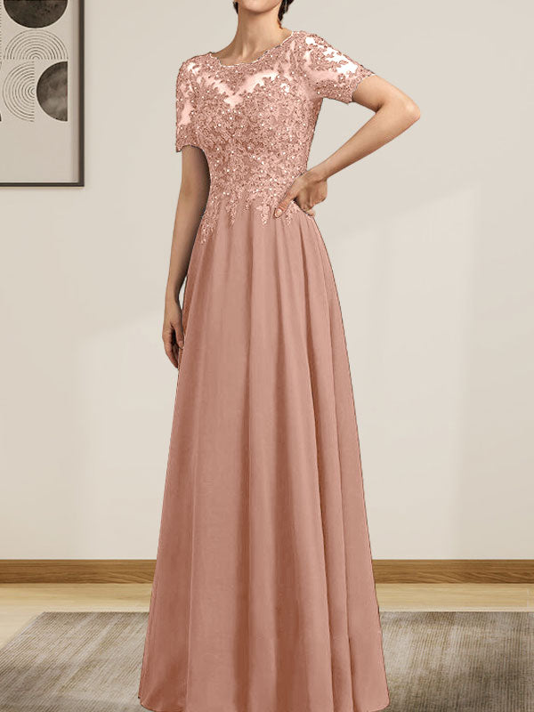 Vestido de corte A, escote ilusión, largo hasta el suelo, de gasa y encaje, con lentejuelas y pedrería, para la madre de la novia.