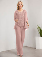 Vestido de novia de gasa con encaje y lentejuelas, estilo mono/pantalón, largo hasta el suelo, con escote redondo.