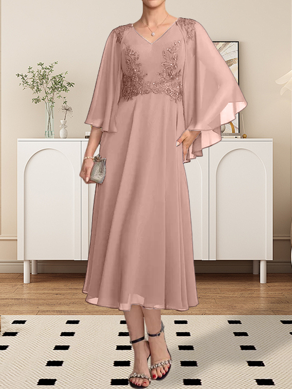Vestido de corte A, escote en V, largo hasta la rodilla, de gasa, encaje, con lentejuelas y pedrería para la madre de la novia.