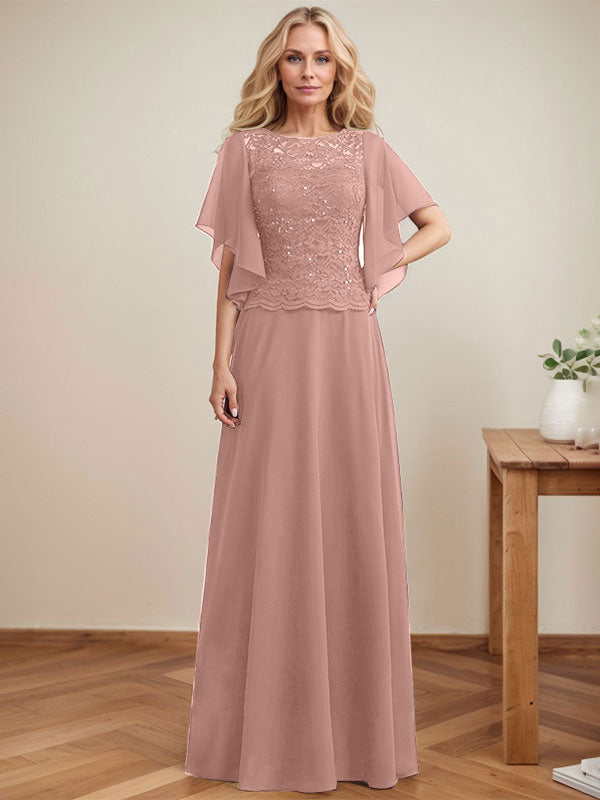 Vestido de novia de corte A, escote redondo, ilusión, largo hasta el suelo, de encaje y gasa con lentejuelas. 