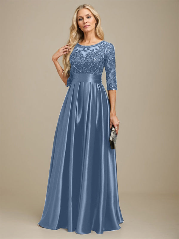 Robe de mariée longue en satin stretch dentelle et dentelle, coupe trapèze, décolleté illusion, ornée d'un nœud à sequins 