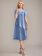 Vestido de corte A, escote redondo, largo hasta la rodilla, para la madre de la novia, con apliques y lentejuelas. 