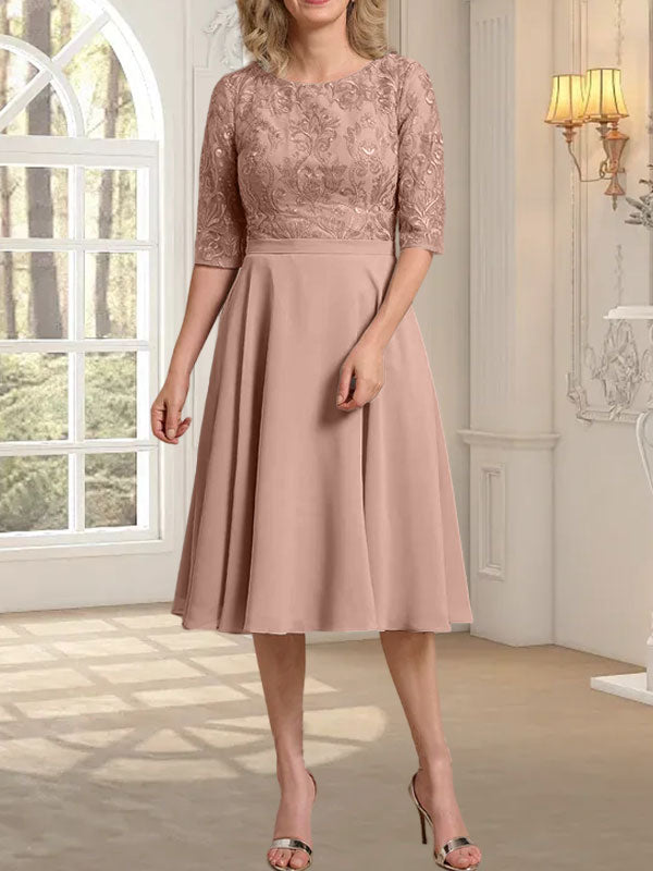 Vestido de novia de gasa de encaje, corte en A, escote redondo y largo hasta la rodilla.