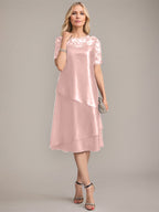 Vestido de corte A, escote redondo, largo hasta la rodilla, para la madre de la novia, con apliques y lentejuelas. 