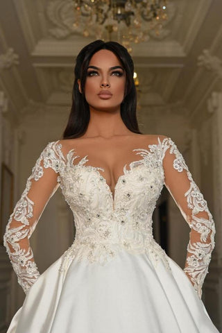 Vestidos de novia elegantes de satén y encaje, corte en A, manga larga, escote corazón y bolsillos.