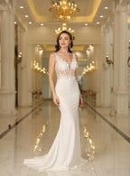 Elegante vestido largo hasta el suelo con escote en V, sin mangas, apliques de encaje y corte sirena